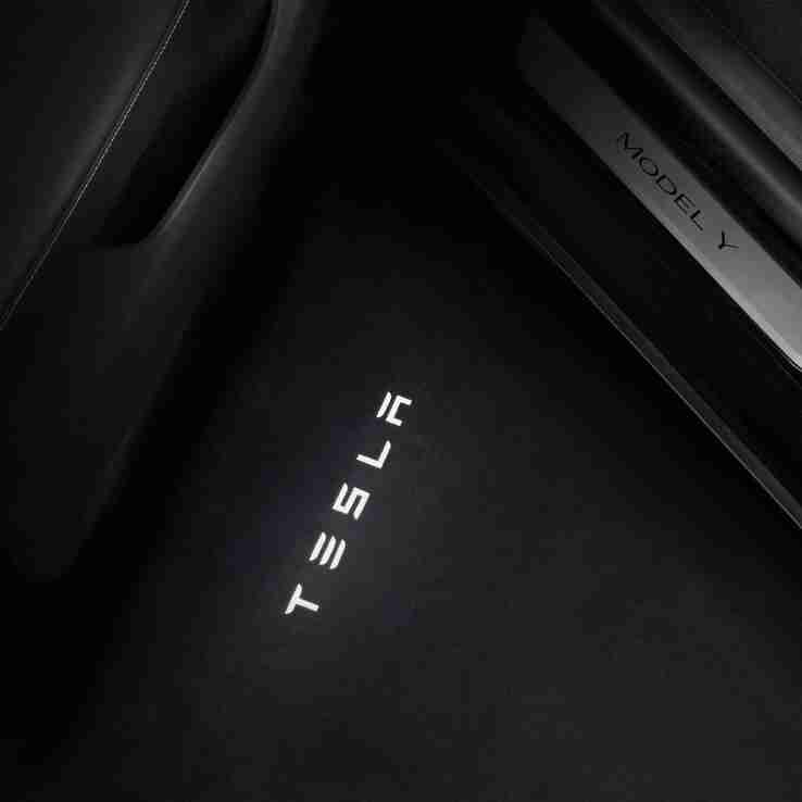 Model Y puddle lights project high-def logo as one of the cheapest ways to deck out a Tesla